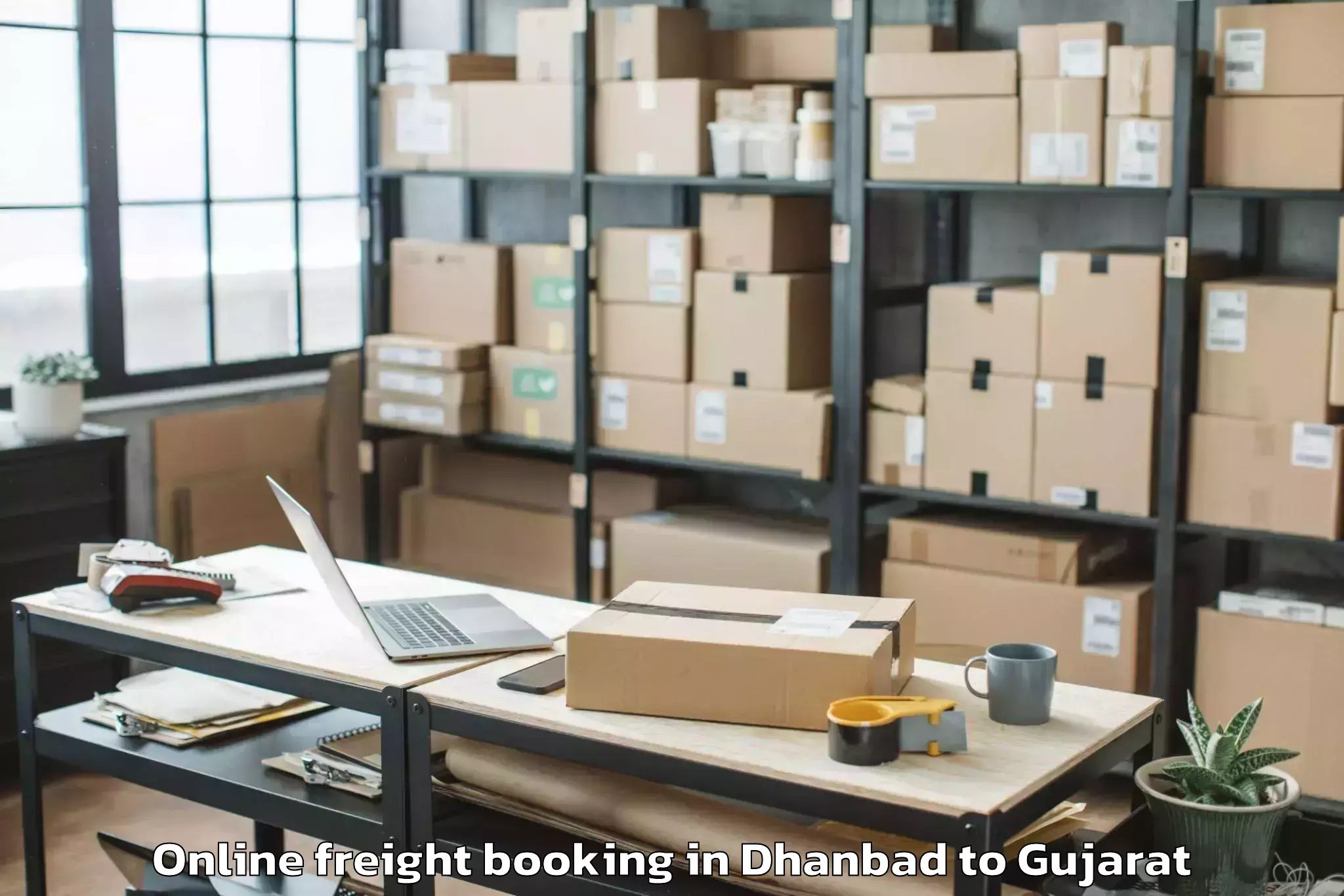 Trusted Dhanbad to Mahudha Online Freight Booking